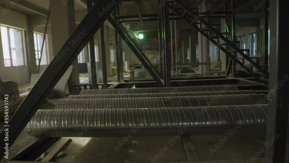 New office building under construction. Pipe heating and ventilation system New office building under construction. Pipe heating and ventilation system