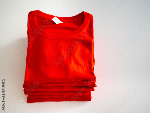 Red folded T-shirt stack