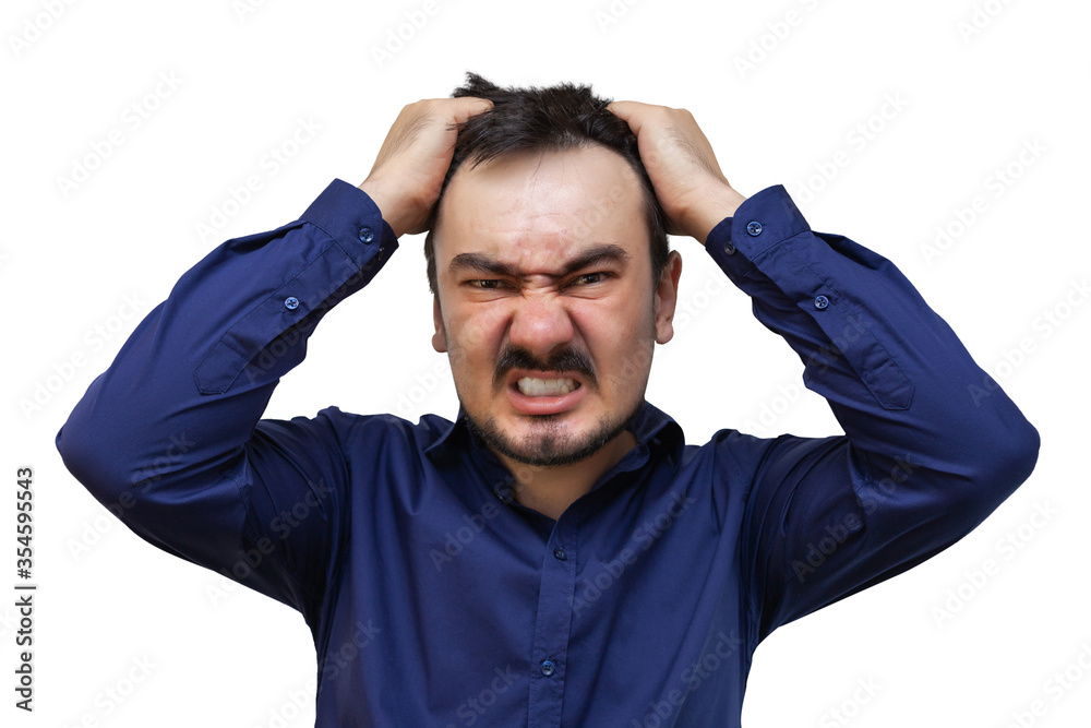 A man shouting in anger. A bankrupt businessman is tearing his hair out A man shouting in anger. A bankrupt businessman is tearing his hair out