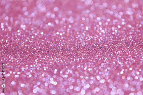 Sparkle Glitter Lights Background. Pink and Silver Colors. Shine Bokeh Effect. For party, holidays, celebration. 