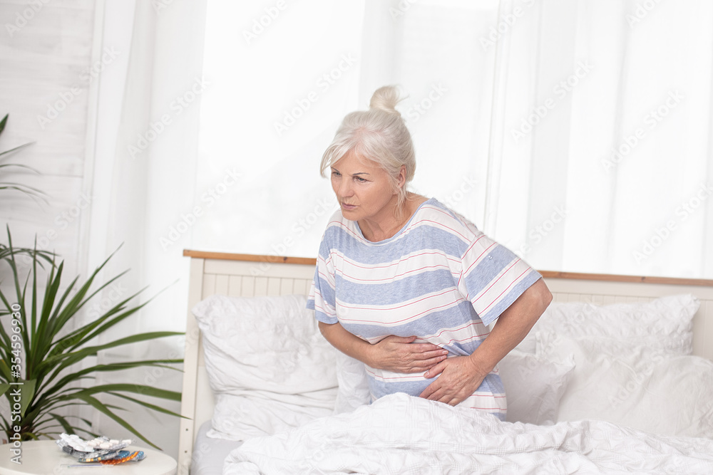 Sick senior woman in bed, at home. Sick senior woman in bed, at home.