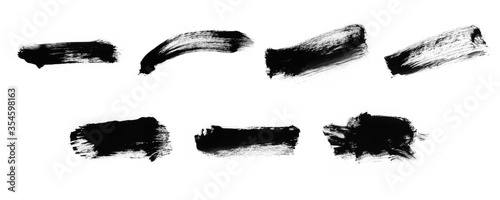 Abstract set of black paint smear and stroke brushes for painting. Beautiful paint brushes