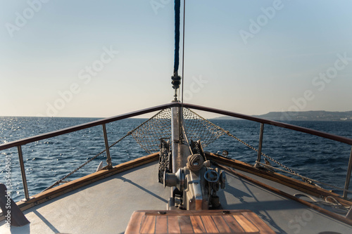 A scenic view that was taken from the bow of a ship at sea in Greece