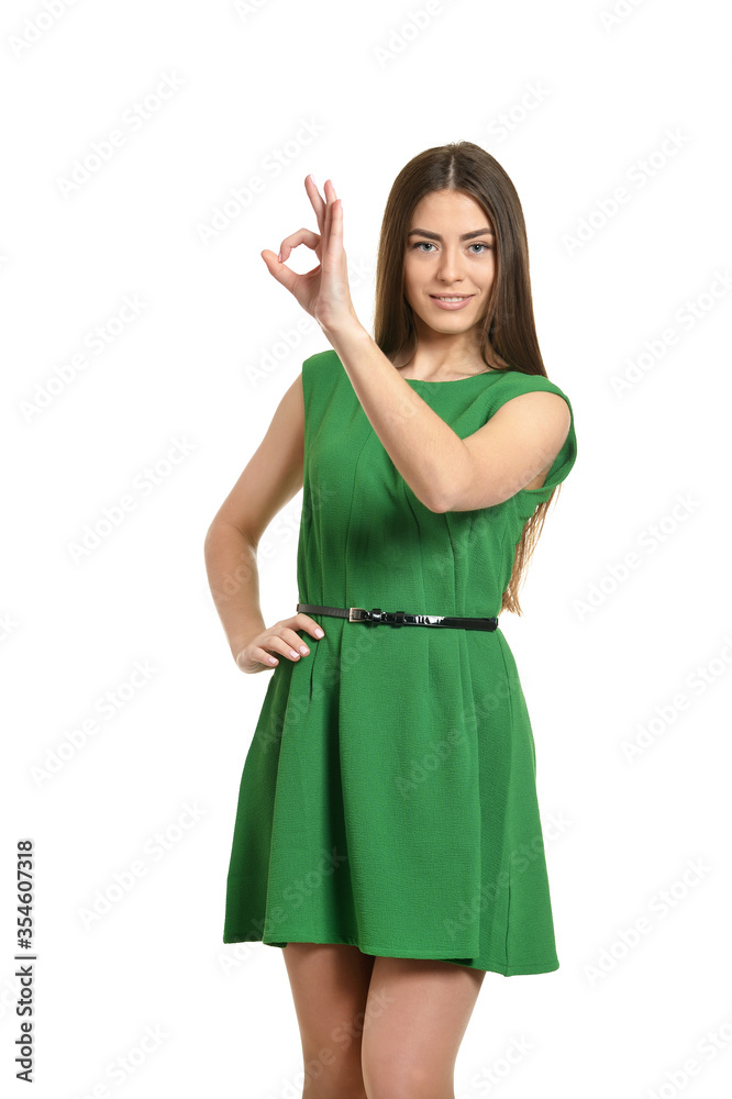 Woman doing OK gesture on white background Woman doing OK gesture on white background
