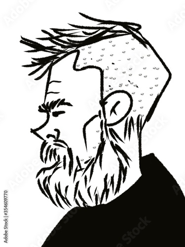 handsome young bearded man in profile