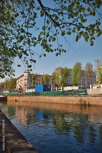 Svisloch river in Gorky park in Minsk, Belarus. Sunny summer day in entertainment park