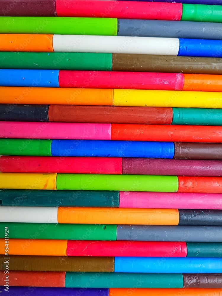 Lots of colorful wax pencils that take up the entire field of view.