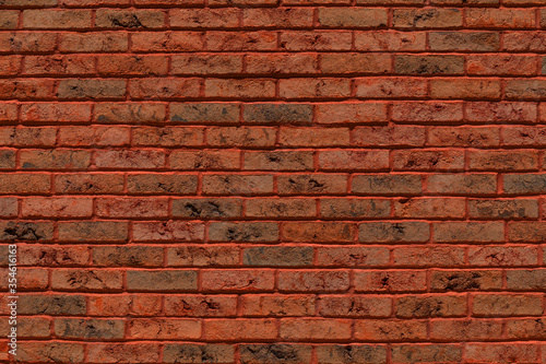 Brick running bond pattern background texture in shades of lush lava orange and red, backdrop with creative copy space, horizontal aspect © Natalie Schorr