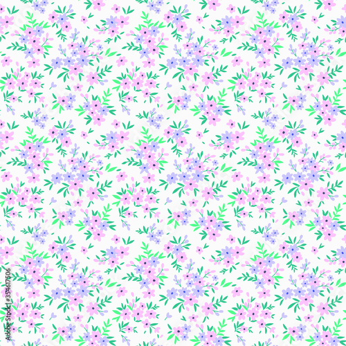 Simple cute pattern in smallpink and lilac flowers on white background. Liberty style. Ditsy print. Floral seamless background. The elegant the template for fashion prints.