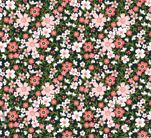 Cute floral pattern in the small flower. Ditsy print. Seamless vector texture. Elegant template for fashion prints. Printing with small pale pink flowers.  Dark background.