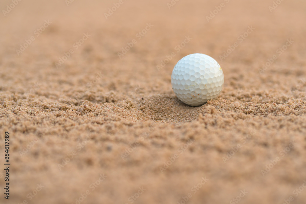Golfer hit Golf ball on sand trap bunker at golf courses Golfer hit Golf ball on sand trap bunker at golf courses