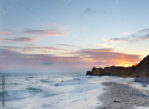 Sunrise on beach at Black Sea. Landscape view from wild beach