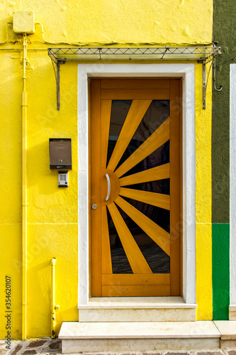 Old traditional door on col...