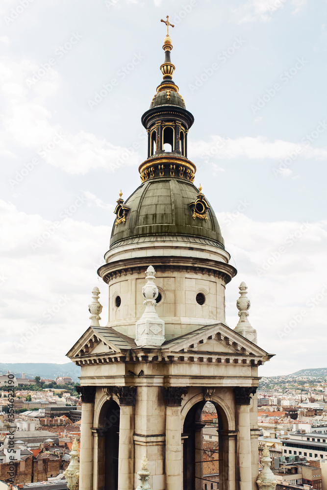 Basilica of Saint Stephen, dome of one of the small towers over cityscape of Budapest, Hungary