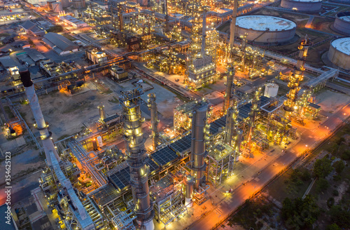 Aerial view by drone of oil petrochemical refinery plant during sunset time