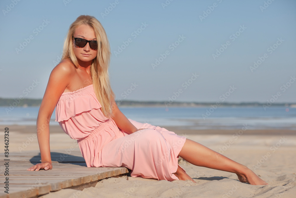 Beautiful woman enjoying summer outdoors Beautiful woman enjoying summer outdoors