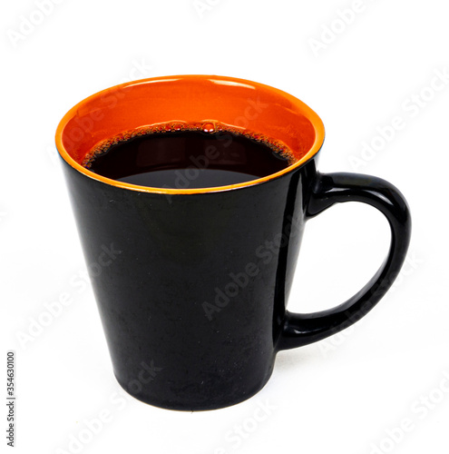 Black and orange coffee mug isolated on white