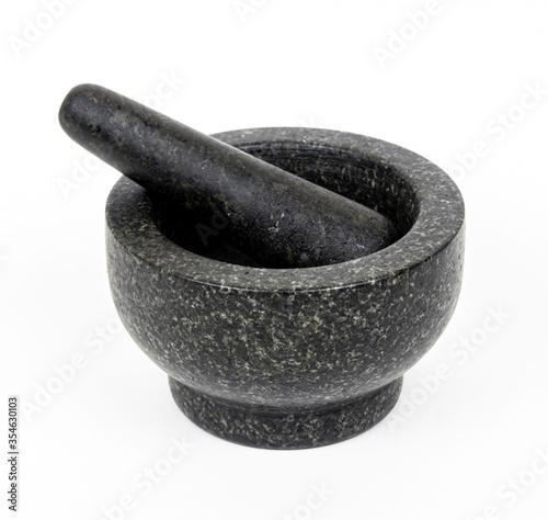 Granite mortar and pestle isolated on white