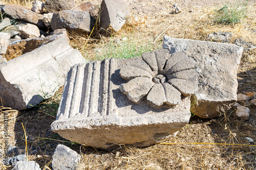 Remains of columns  in ruins of the Greek - Roman city of the 3rd century BC - the 8th century AD Hippus - Susita on the Golan Heights near the Sea of Galilee - Kineret, Israel photo