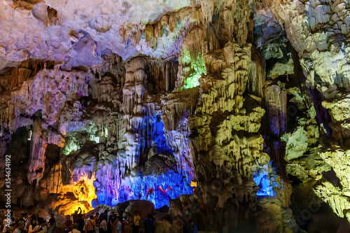 Stalactite and stalagmite formations in a limestone cave of Halong Bay, Vietnam © Walter_D