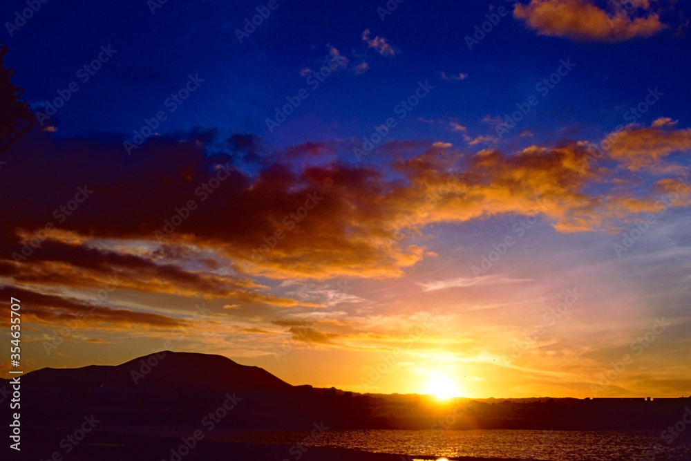 Corralejo the sun setting over Los Lobos Fuerteventura Canary Islands Spain