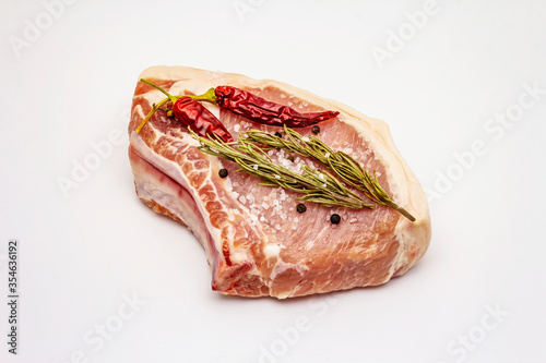 Raw pork steak isolated on white background