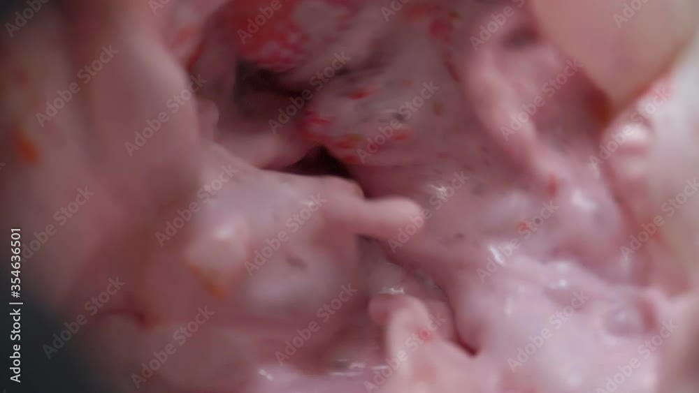 high-power blender mixes strawberries with milk top view, healthy smoothie breakfast super slow motion close-up high-power blender mixes strawberries with milk top view, healthy smoothie breakfast super slow motion close-up