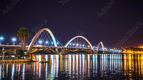 Brasilia, Brazil - March 12, 2020: Cars race across the Juscelino Kubitschek Bridge just after sunset in Brasilia, Brazil.