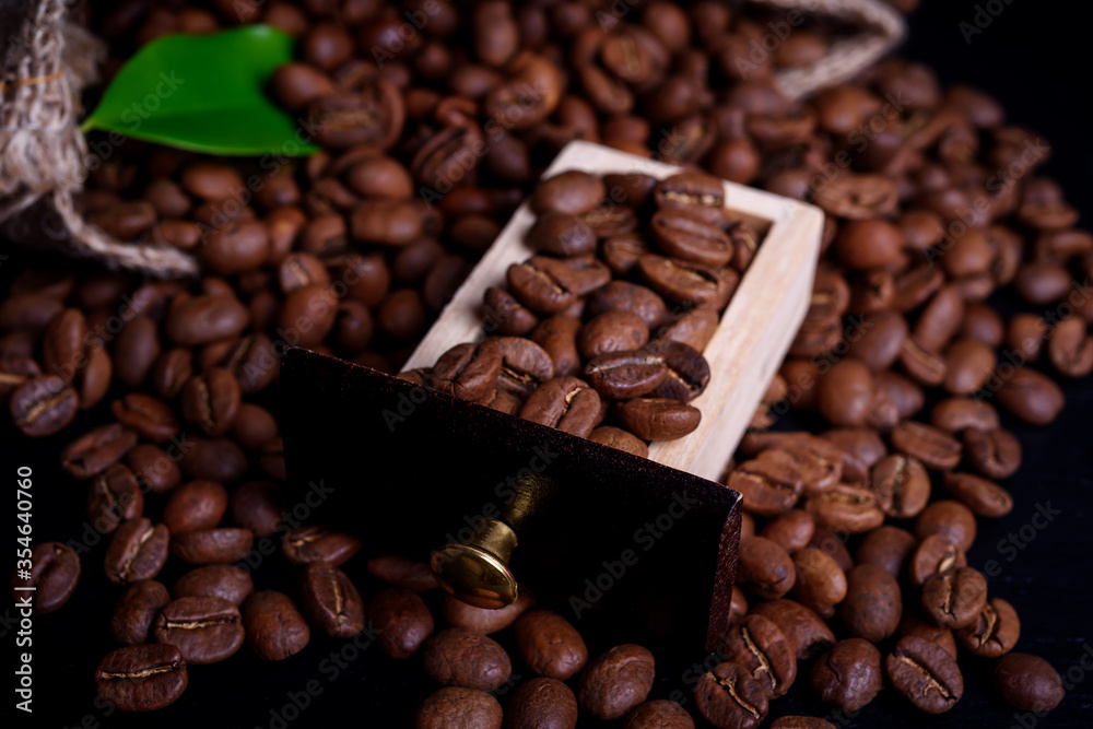 Roasted coffee beans on black background, coffee background Roasted coffee beans on black background, coffee background