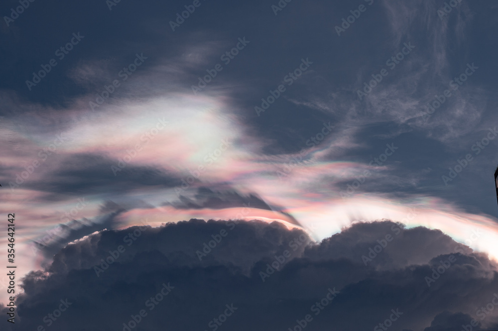 Iridescence is often the rainbow above the clouds. Especially in the evening when the sunset