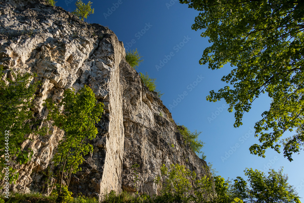 Twardowski limestone rocks, a recreational place (climbing, mountaineering, sport) near the flooded quarry Zakrzowek in Krakow. Part of the Bielany-Tyniec landscape park (Poland)