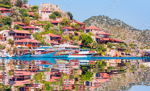 Kekova island with The ancient Lycian sarcophagus in water - Simena village, Kekova, Turkey.