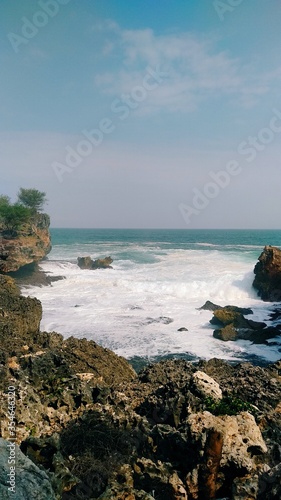 Beautiful beach with stunning views of rocks, nature and whites sand