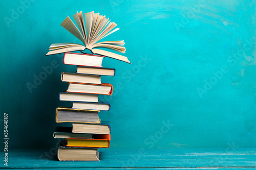 Books on wooden desk table and abstract background. Education background. Copy Space. Back to school.