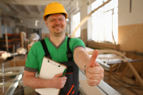 Close up of delighted builder that being on the facility