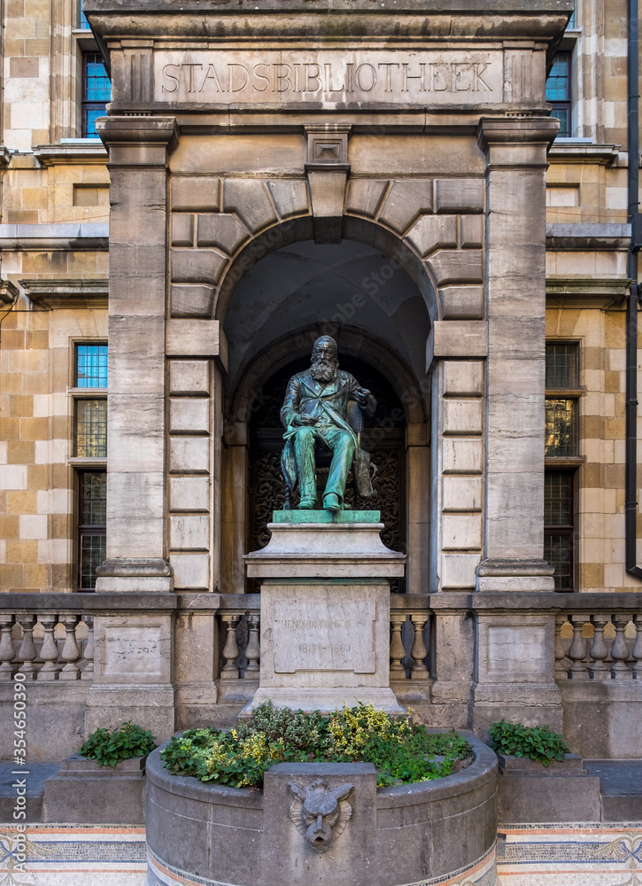 Public Statue of historic Belgian author Hendrik Conscience outside the heritage library.