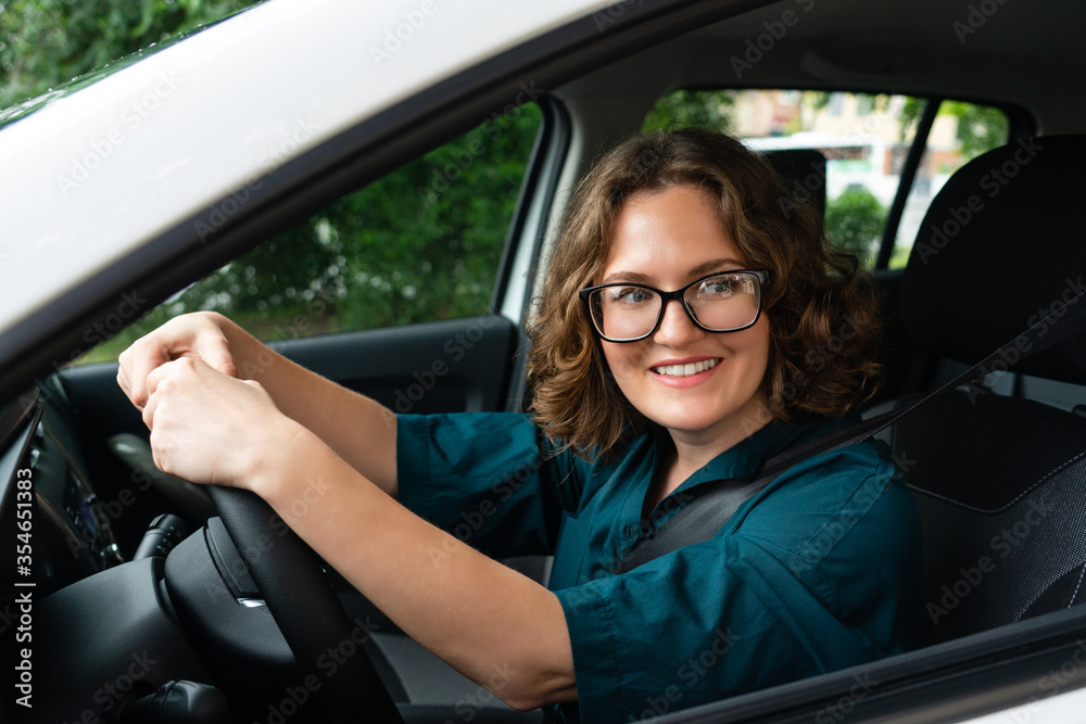 Woman driver driving a car Woman driver driving a car