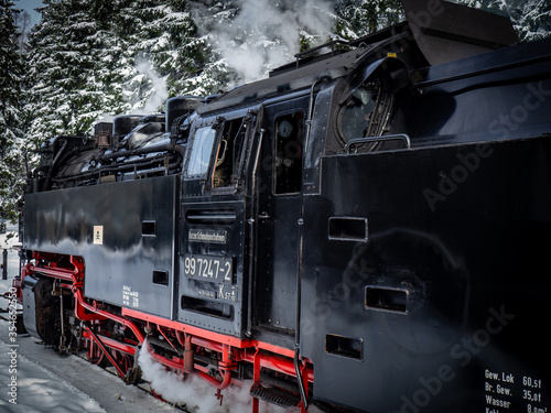 Steam train on the Brocken mountain with snow