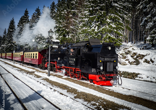 Steam train on the Brocken mountain with snow