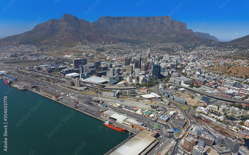 Cape Town, Western Cape / South Africa - 02/15/2017: Aerial photo of Table Bay Harbour with Cape Town CBD and Table Mountain in the background