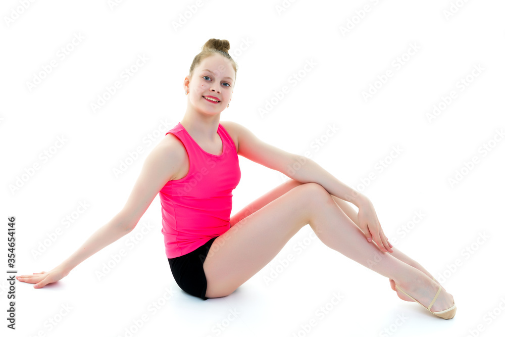 The gymnast prepares to perform the exercise. The gymnast prepares to perform the exercise.