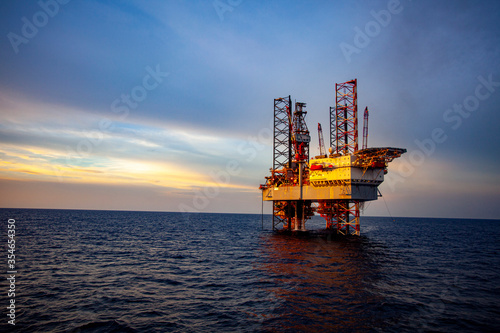 oil rig at sunset