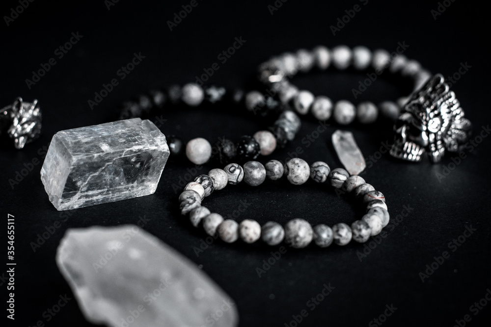close up of a diamond and bracelets close up of a diamond and bracelets
