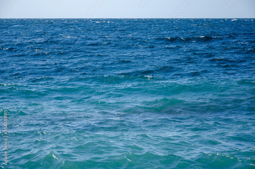 Seascape background vivid blue sea and clear sky Seascape background vivid blue sea and clear sky