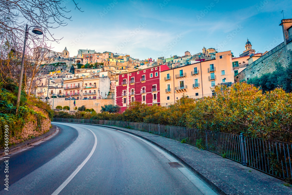 Attractive spring cityscape of Ragusa town with colorful houses. Amazing morning scene of Sicily, Italy, Europe. Traveling concept background.