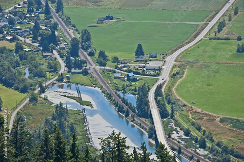 This is an aerial view of a small town, country life with roads, rivers, farms and fields of Blanchard, WA in Skagit County, America.  Cute, quaint place to travel. photo