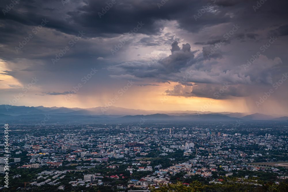 CHIANG MAI, THAILAND - May 27,2020:  Aerial Panorama View of Chiang Mai City with rain and dramatic cloud, Thailand