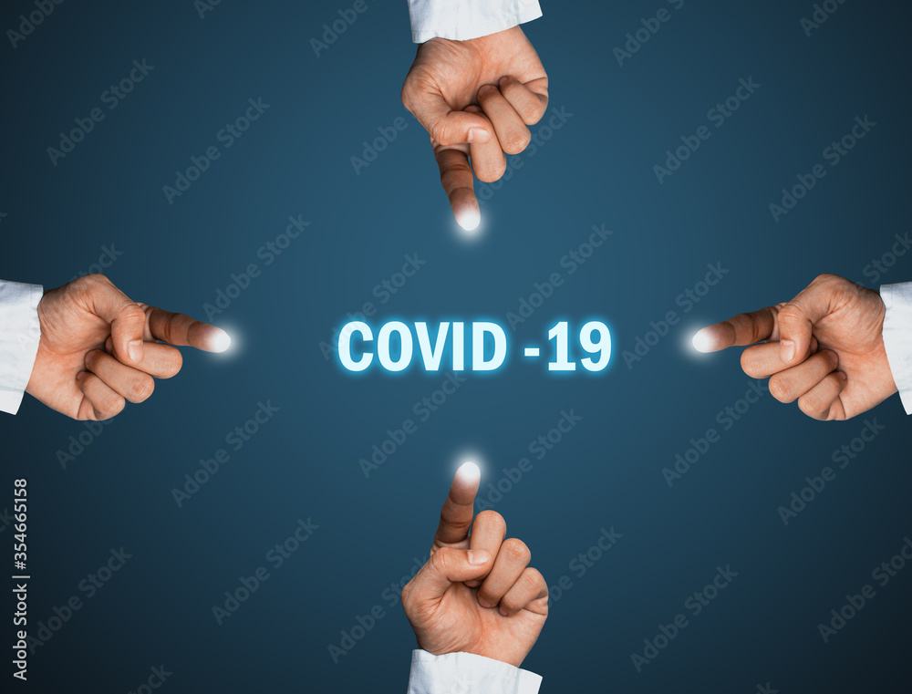 Obraz premium male hands and text with covid 19