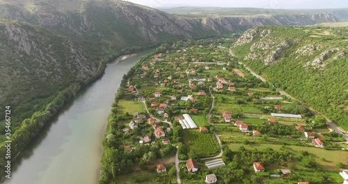 An aerial view shows the village of Pocitelj, Bosnia and the Neretva River that runs alongside. photo