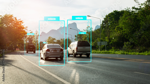 Artificial intelligence concept.Software ui analytics and recognition vehicles in road with flare light effect.Machine learning analytics identify vehicles technology.